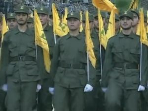 Hezbollah. Photo by Voice of America - YouTube: https://www.youtube.com/watch?v=gnjWMsXGNrs – View/save archived versions on archive.org and archive.today, Public Domain, https://commons.wikimedia.org/w/index.php?curid=65046088