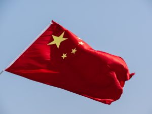 Flag of the People's Republic of China. Photo by Reinhold Möller, CC BY-SA 4.0, https://commons.wikimedia.org/w/index.php?curid=107325534