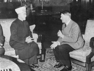 The Grand Mufti of Palestine received by Hitler.  Photo by Bundesarchiv, Bild 146-1987-004-09A / Heinrich Hoffmann / CC-BY-SA 3.0, CC BY-SA 3.0 de, https://commons.wikimedia.org/w/index.php?curid=5483348