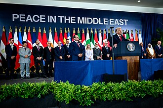 U.S. President Donald Trump speaks during a global leadership summit on the end of the war in Gaza between Israel and Hamas at the Tonino Lamborghini International Convention Center in Sharm el-Sheikh, Egypt, Monday, October 13, 2025. Photo by Daniel Torok - https://www.flickr.com/photos/202101414@N05/54855575883/, Public Domain, https://commons.wikimedia.org/w/index.php?curid=176713659