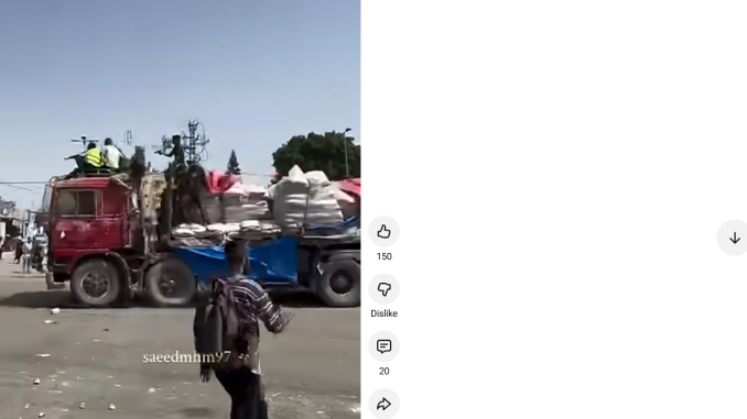 Hamas terrorists Hijacking Aid Truck in Gaza.  Screengrab via Youtube https://www.youtube.com/shorts/k9QcUyZQtfs