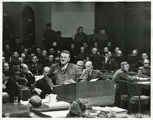  Prosecutor Ralph Albrecht making an address at the Nuremberg trials.  Photo by United States Army Signal Corps photographer - Harvard Law School Library, Harvard University [1], Public Domain, https://commons.wikimedia.org/w/index.php?curid=13279704