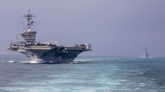 Abraham Lincoln, flagship of the Abraham Lincoln Carrier Strike Group, is underway conducting routine operations in the U.S. 7th Fleet area of operations. (U.S. Navy photo by Mass Communication Specialist Seaman Joey Sitter) The appearance of U.S. Department of War (DoW) visual information does not imply or constitute DoW endorsement.