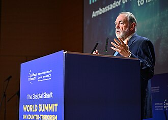Ambassador Mike Huckabee Speaks at the Shabtai Shavit World Summit on Counterterrorism on September 18, 2025. By U.S. Embassy Jerusalem - https://www.flickr.com/photos/46886434@N04/54794654407/, CC BY 4.0, https://commons.wikimedia.org/w/index.php?curid=176118029