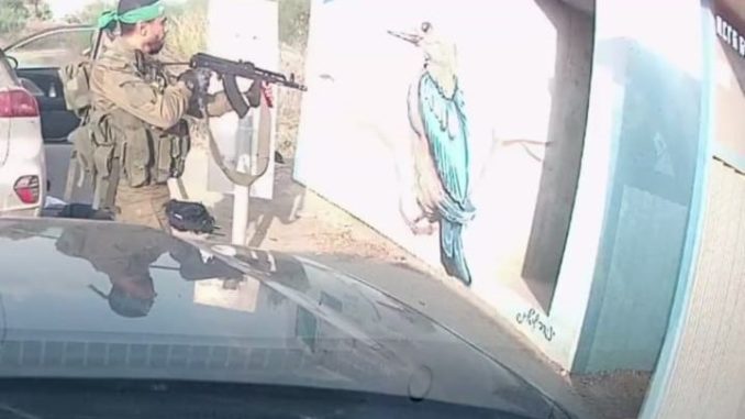 Hamas shooting into bomb shelter near Supernova Festival October 7 2023.  Photo by Dashcam footage: No human authorship - https://www.nbcnews.com/video/dashcam-video-shows-hamas-gunmen-toss-grenade-into-bomb-shelter-194790469769, Public Domain, https://commons.wikimedia.org/w/index.php?curid=142219823