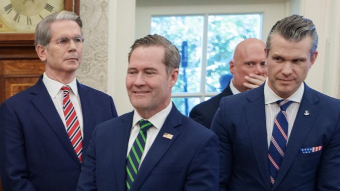 Mike Waltz with Scott Bessent and Pete Hegseth. Photo by The White House - https://www.flickr.com/photos/202101414@N05/54350762981/, Public Domain, https://commons.wikimedia.org/w/index.php?curid=162574382