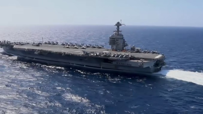 USS Gerald R. Ford With 7 Warships Deploying Toward Iran.    February 14, 2026.  Screengrab via Youtube https://www.youtube.com/watch?v=Qdk4U3MYWO4