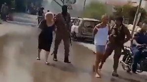 US President Donald Trump must not abandon his demand that Hamas fully disarm before going forward with his Gaza peace plan. Pictured: Hamas terrorists in Gaza City on November 2, 2025. Pictured: Hamas gunmen capturing civilian hostages from Kibbutz Beéri on October 7 2023. Photo by Bodycam footage: No human authorship - https://www.wsj.com/video/cctv-shows-hamas-militants-attack-on-kibbutz-beeri/BD0AE9E0-36E8-43A1-88F9-30794FC02977, Public Domain, https://commons.wikimedia.org/w/index.php?curid=144136312