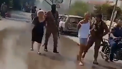 US President Donald Trump must not abandon his demand that Hamas fully disarm before going forward with his Gaza peace plan. Pictured: Hamas terrorists in Gaza City on November 2, 2025. Pictured: Hamas gunmen capturing civilian hostages from Kibbutz Beéri on October 7 2023. Photo by Bodycam footage: No human authorship - https://www.wsj.com/video/cctv-shows-hamas-militants-attack-on-kibbutz-beeri/BD0AE9E0-36E8-43A1-88F9-30794FC02977, Public Domain, https://commons.wikimedia.org/w/index.php?curid=144136312