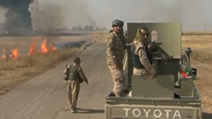 Kurdish Peshmerga forces engaging militants in Iraq. Screengrab via Youtube