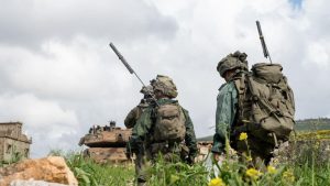 IDF soldiers and a tank operate in southern Lebanon on March 21, 2026. (photo credit: IDF SPOKESPERSON'S UNIT)