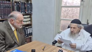 US Ambassador Mike Huckabee meets with Rabbi Dov Landau. Screenshot via Youtube