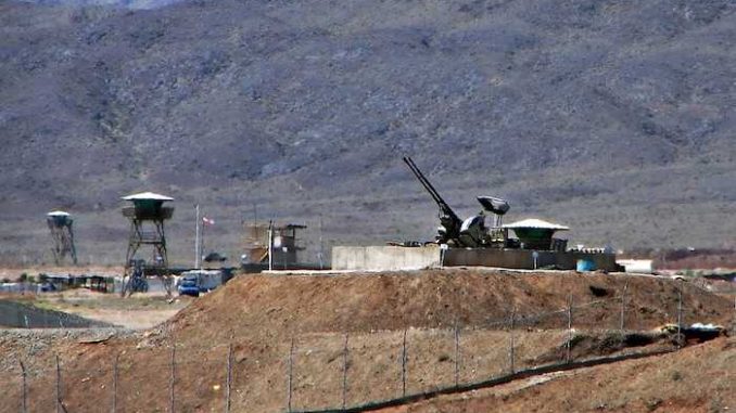 Anti-aircraft guns (Samavat 35mm Anti Aircraft Guns (Oerlikon 35mm)?) guarding Natanz Nuclear Facility, Iran by Hamed Saber, Creative Commons Attribution 2.0