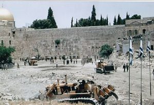 A few days after Israel entered the old city of Jerusalem in the Six Days War it cleared the most sacred Jewish place - the Western Wall of the Temple. Photo by Yehuda Greenberg, Pikiwiki Israel, CC BY 2.5, https://commons.wikimedia.org/w/index.php?curid=47307859