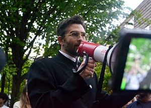 Hasan Piker speaking at a rally for Chris Rabb in Philadelphia, PA on 30 April 2026. By Morgan.rice.bassline.design - Own work, CC BY 4.0, https://commons.wikimedia.org/w/index.php?curid=190850637