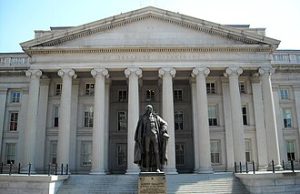 Facade of the Treasury Department in Washington, D.C. The building is a National Historic Landmark. The statue of Albert Gallatin, the first Secretary of the Treasury, is in the foreground. By AgnosticPreachersKid - Own work, CC BY-SA 3.0, https://commons.wikimedia.org/w/index.php?curid=4119780