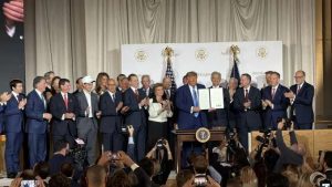 President Donald Trump headlines an AI summit to unveil America.gov, signing an executive order joined by members of his cabinet. Photo: Sarah Roderick-Fitch / The Center Square