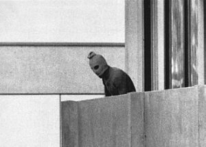 A member of the Arab terrorists which seized members of the Israeli Olympic Team in 1972. Photo by AP Photo/Kurt Strumpf (? – 2014) - https://apnews.com/article/winter-olympics-entertainment-sports-munich-f14bab3397569badf8e4cca273c9af66, Public Domain, https://commons.wikimedia.org/w/index.php?curid=160470235